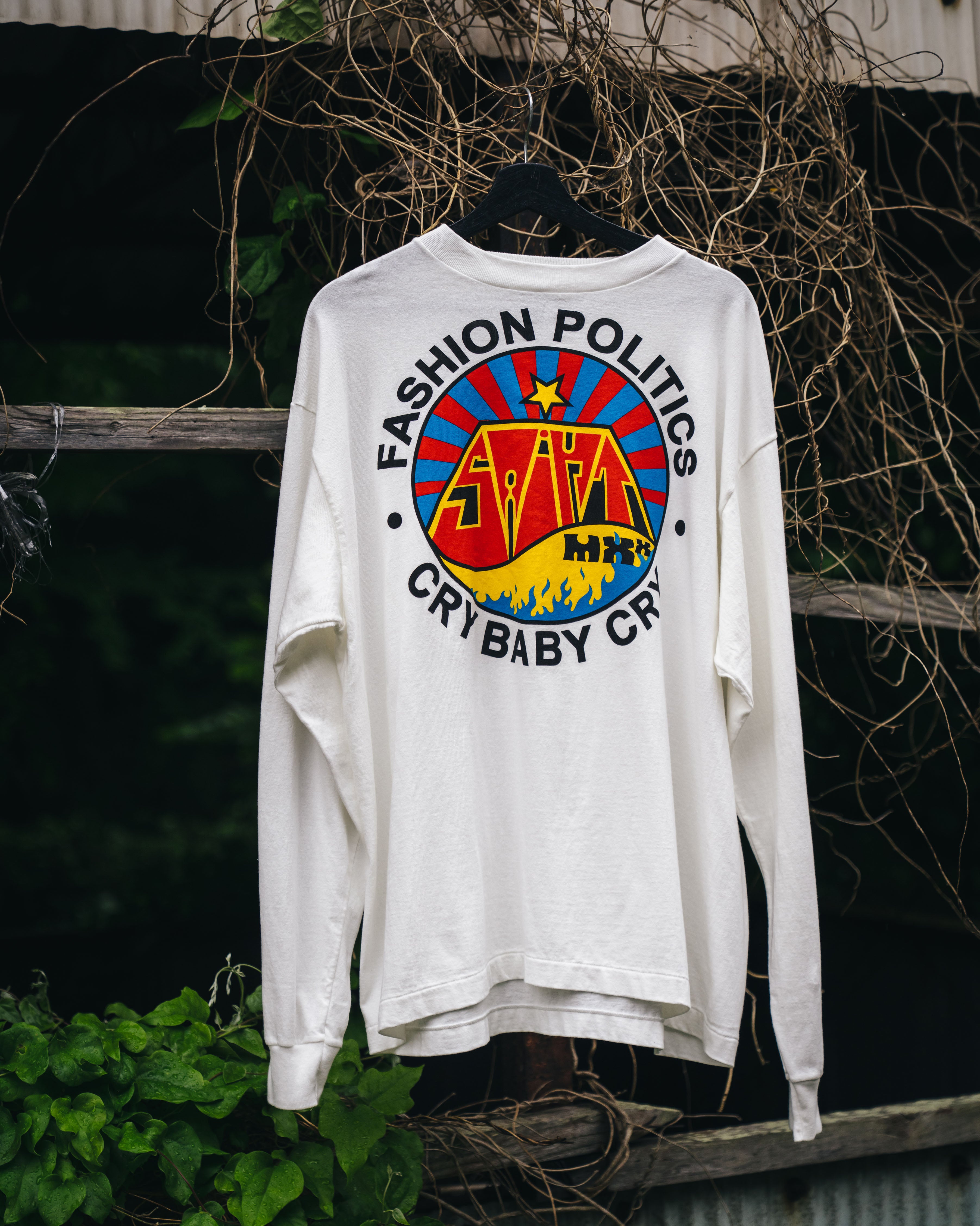 SAINT Mxxxxxx]LS TEE/FASHION POLITICS/WHITE(SM-HR1-0000-034) – R&Co.