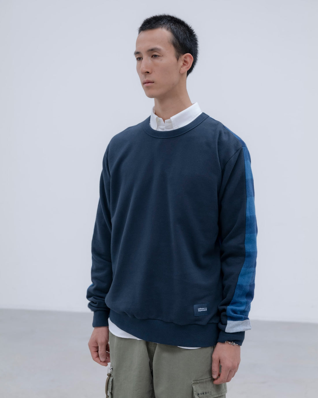 [uniform experiment]LINE FLANNEL CHECK PANELED CREWNECK TOP(UE-262042)