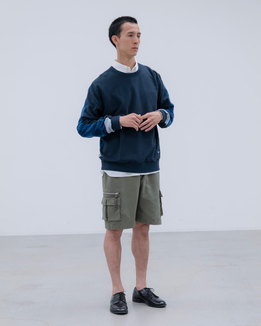 [uniform experiment]LINE FLANNEL CHECK PANELED CREWNECK TOP(UE-262042)
